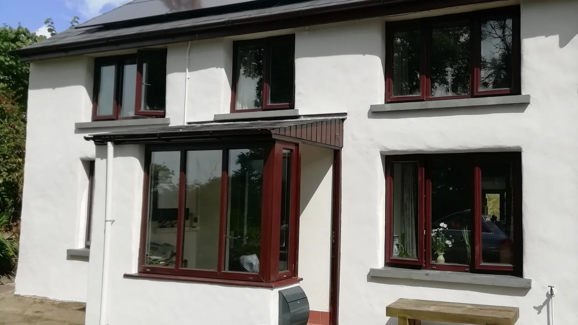 A house painted with Chalky Grey masonry paint