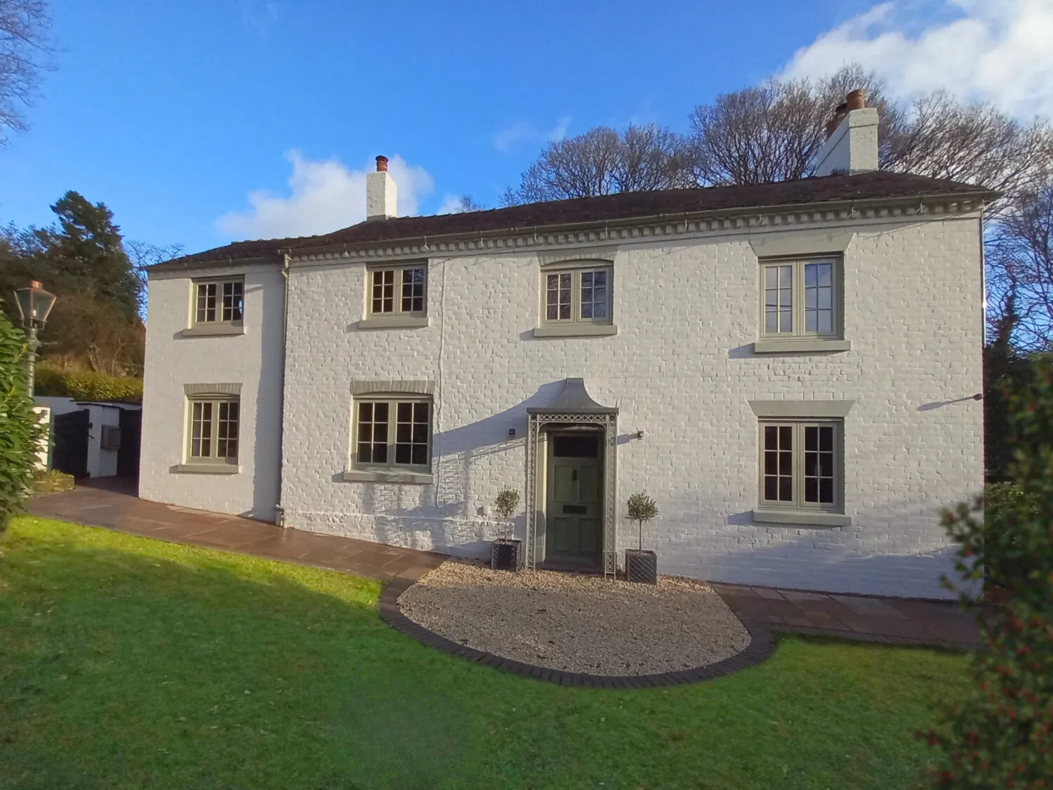 A house painted with Heritage White paint colour