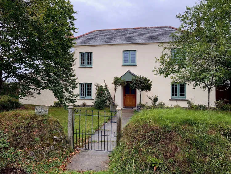 A rendered house after painting