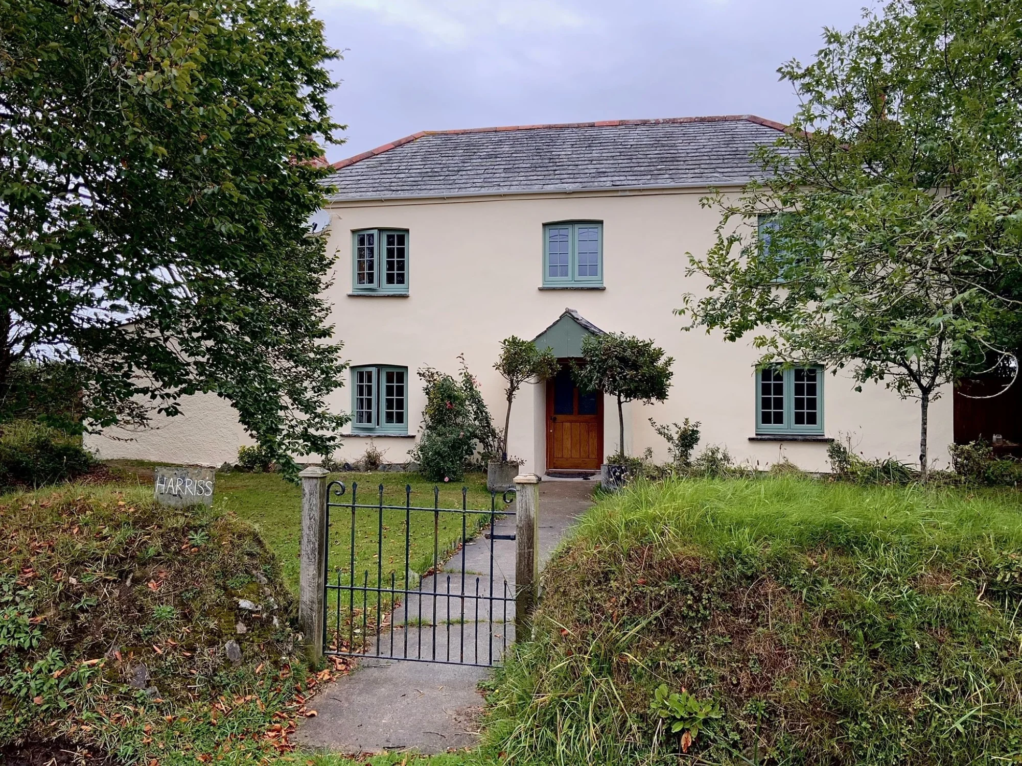 A rendered house after painting