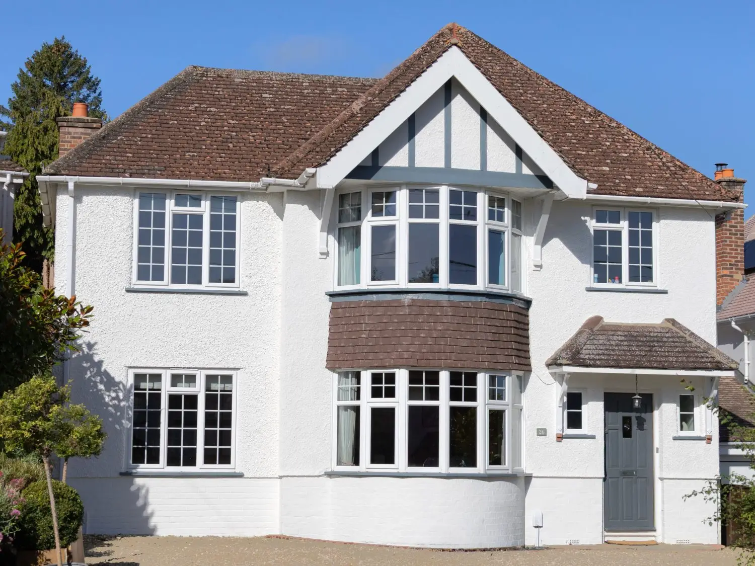 A white house painted by Nick Thorn