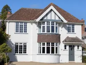 A white house painted by Nick Thorn