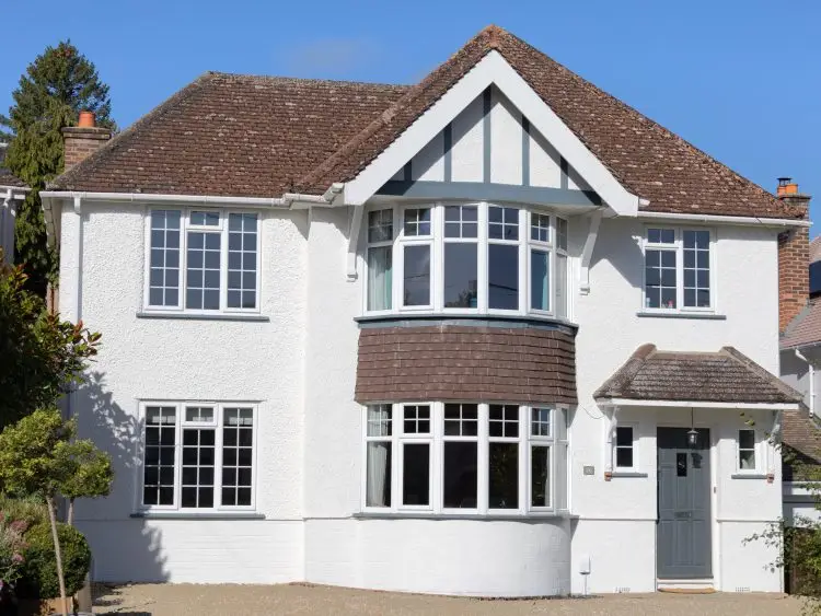 A white house painted by Nick Thorn