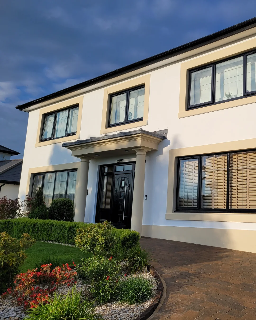 Andrew Barnett's house painted with white masonry paint