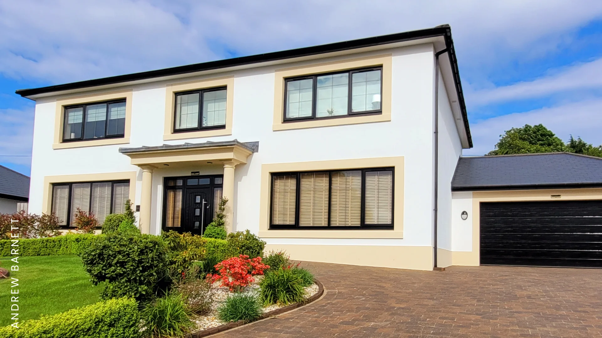 Andrew's house painted with white masonry paint
