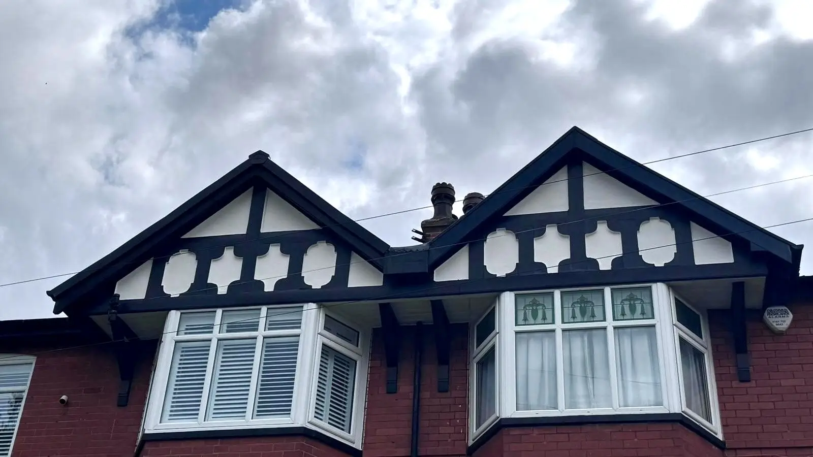 Black masonry paint used on home exterior