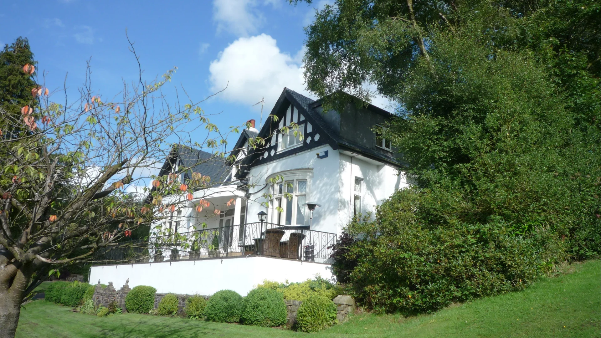 Black masonry paint used on white house