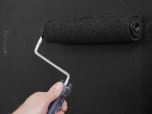 Dark masonry paint with roller