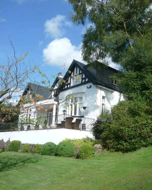 Gary's house painted with white masonry paint