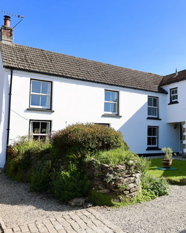Hillside Cottage painted with white masonry paint