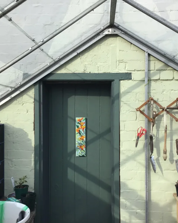 Jane Raybould using green masonry paint