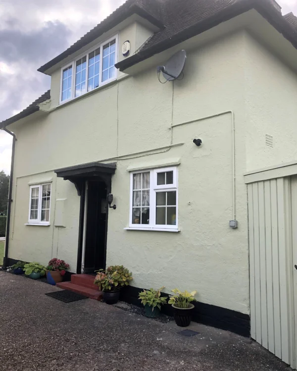 Lindsay Sweeney using green masonry paint