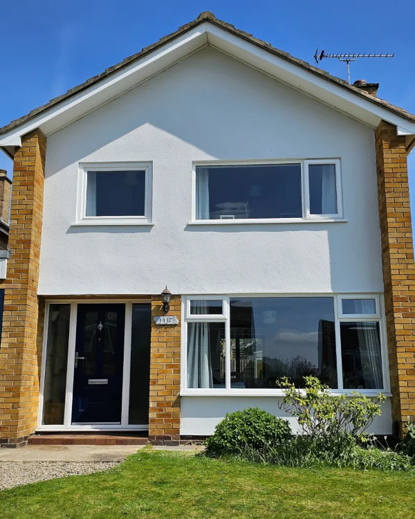 Marcus Margerison using Smokey White masonry paint