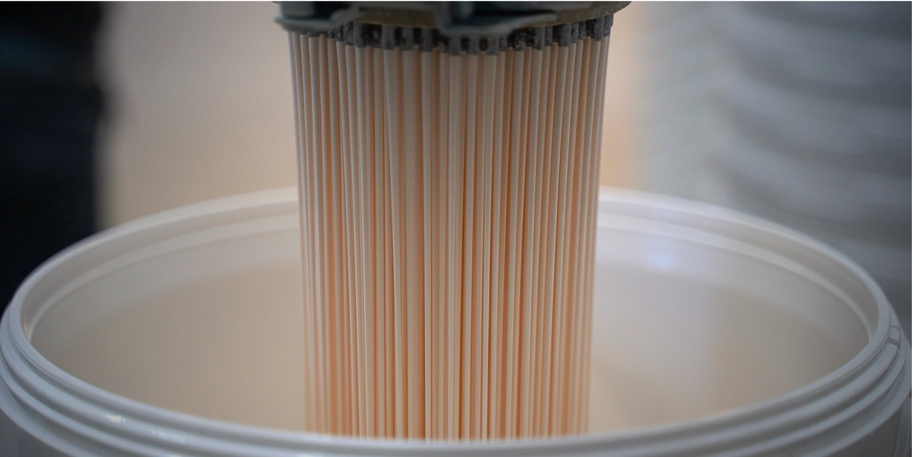 Paint being filled into tub