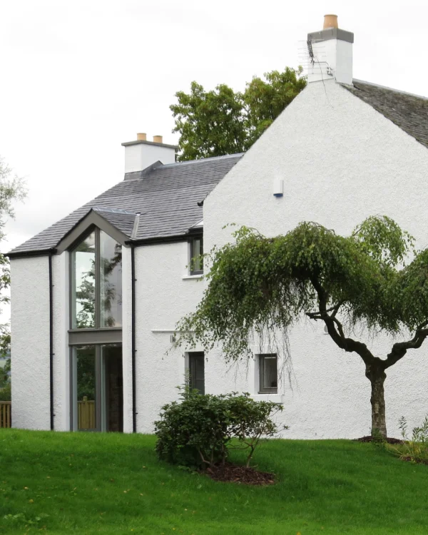 Robin Chisholm's house painted with white masonry paint